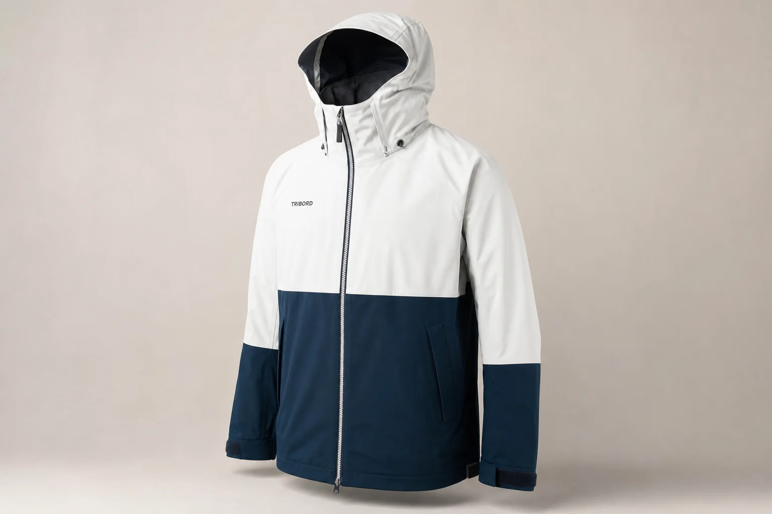 Five Decathlon rain jackets and pants displayed on neutral backdrop