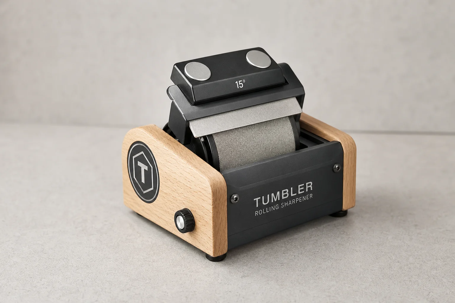 Five different knife sharpeners arranged on concrete surface