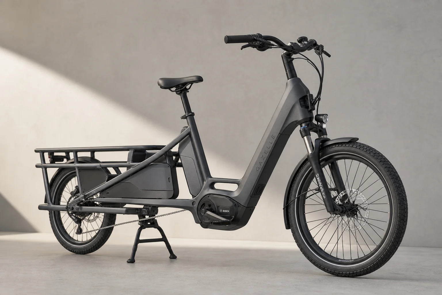 Urban Arrow Breeze longtail cargo e-bike with upright frame and rear cargo platform on neutral background