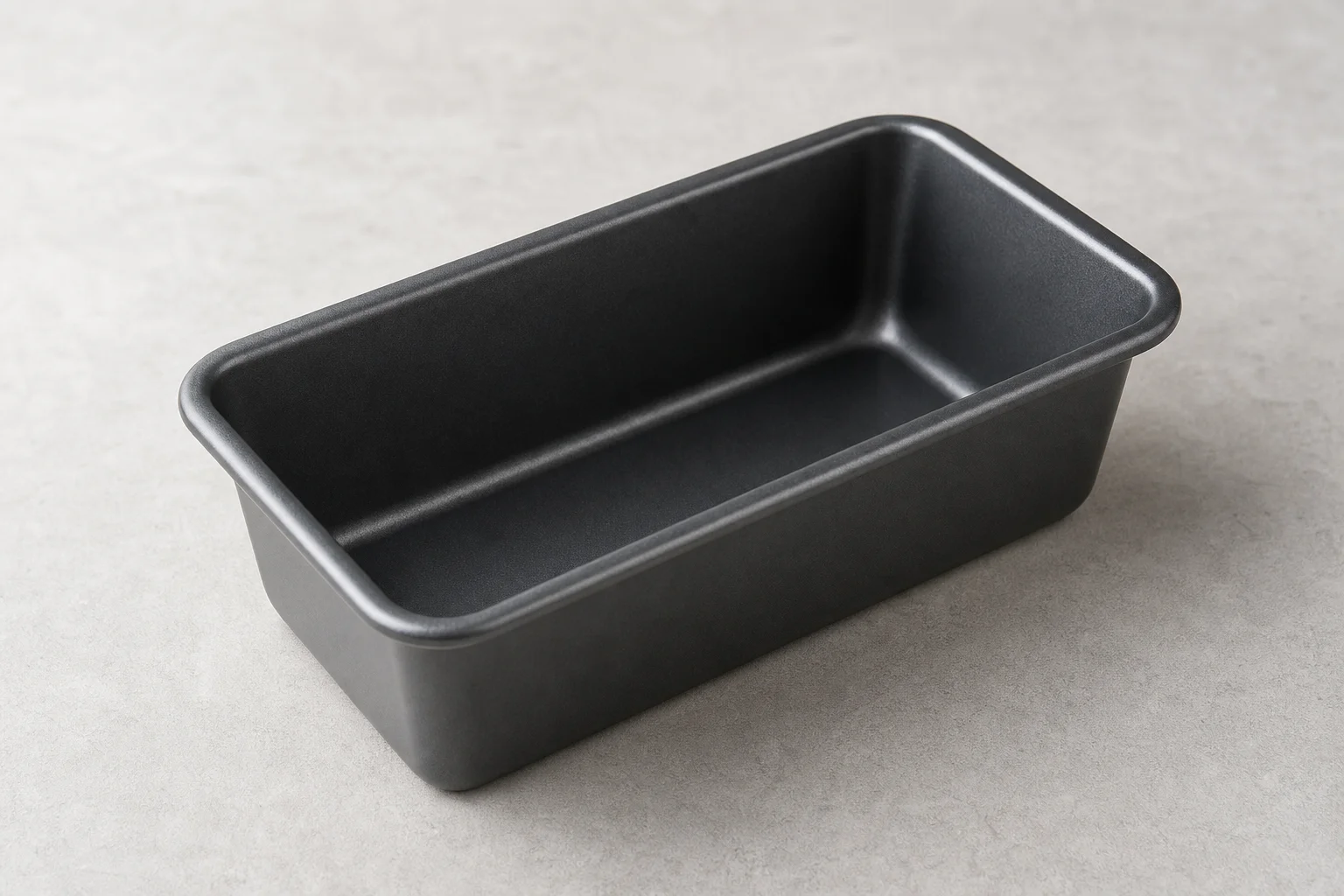 Collection of small-batch baking equipment on marble surface
