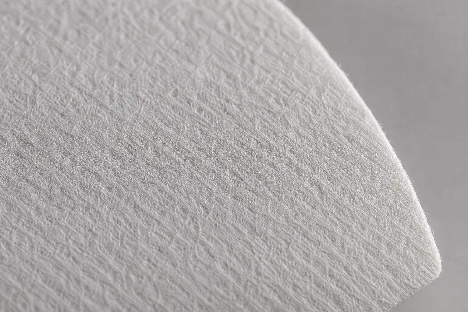 Microscopic view of filter paper weave texture and fiber structure