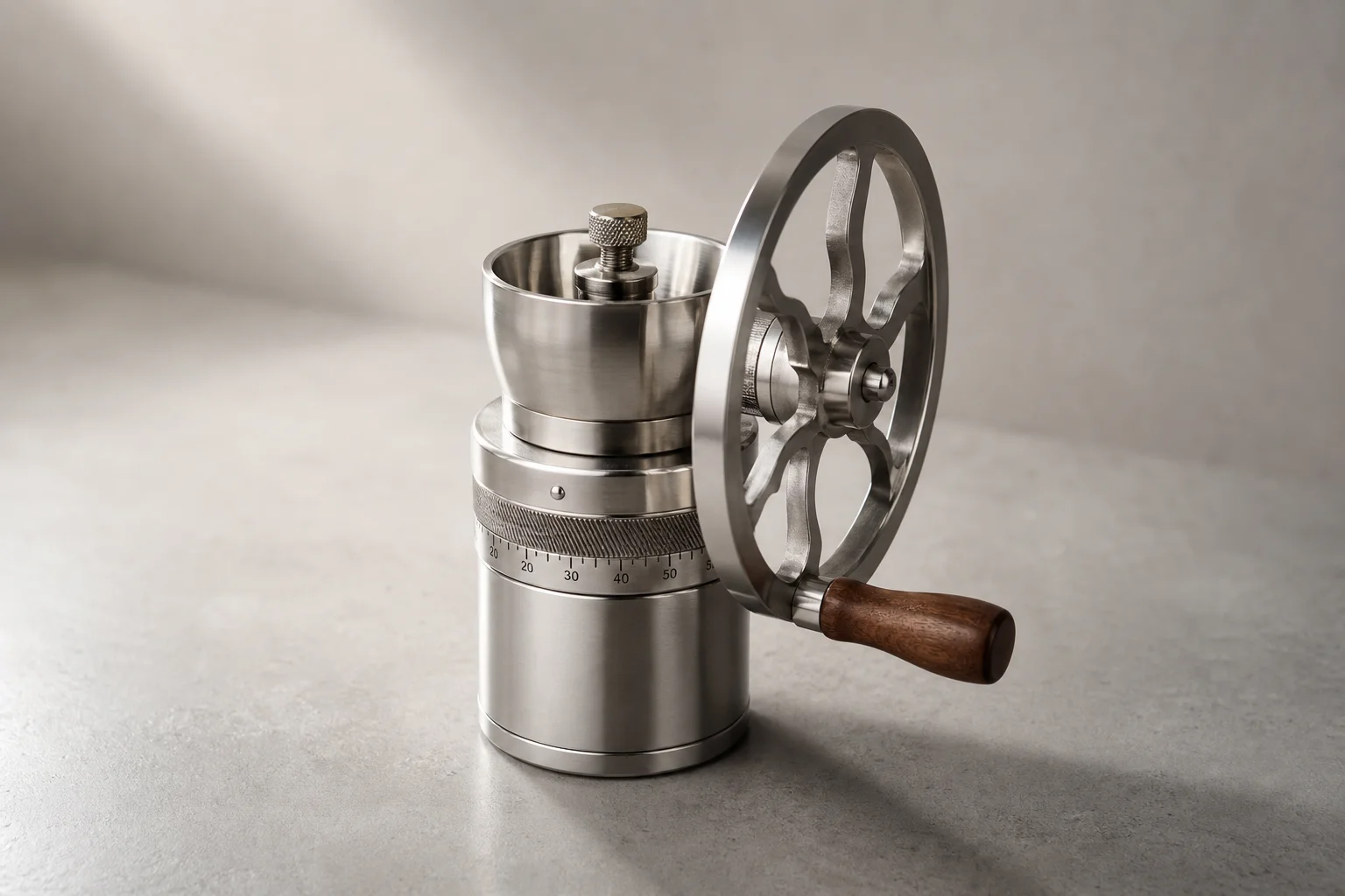 Weber Workshops HG-2 hand grinder with large flywheel on concrete surface
