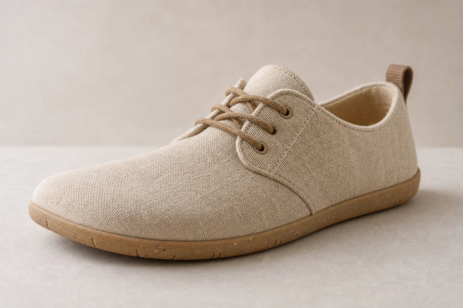 Collection of barefoot shoes from multiple brands displayed on neutral backdrop