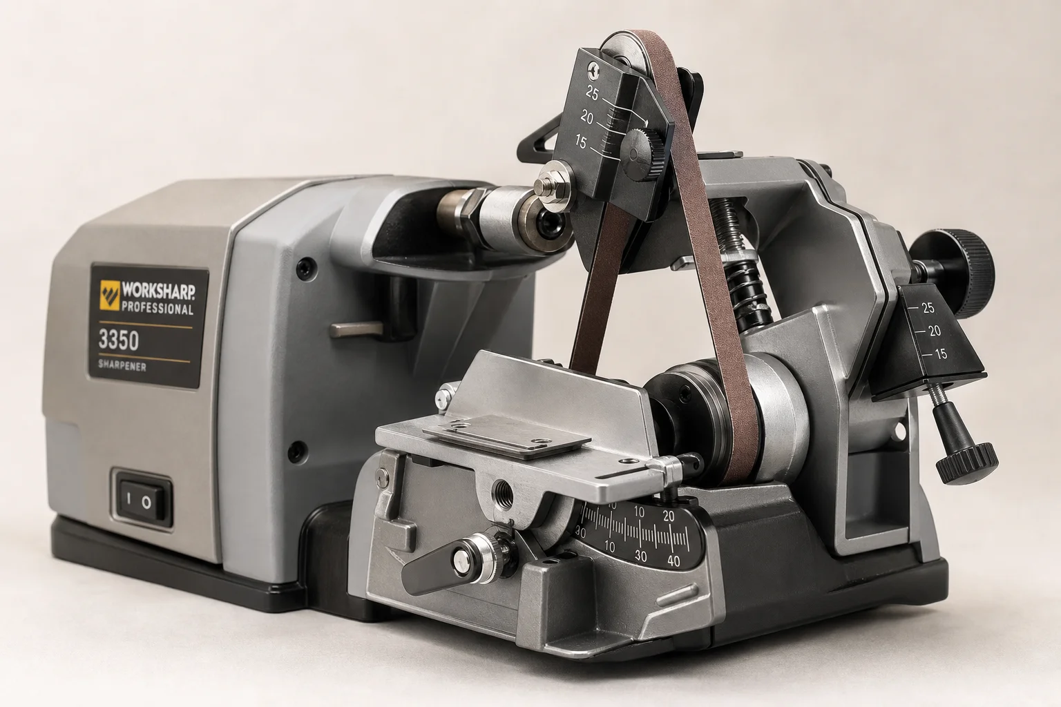 Five knife sharpeners arranged on concrete surface from manual to professional electric models
