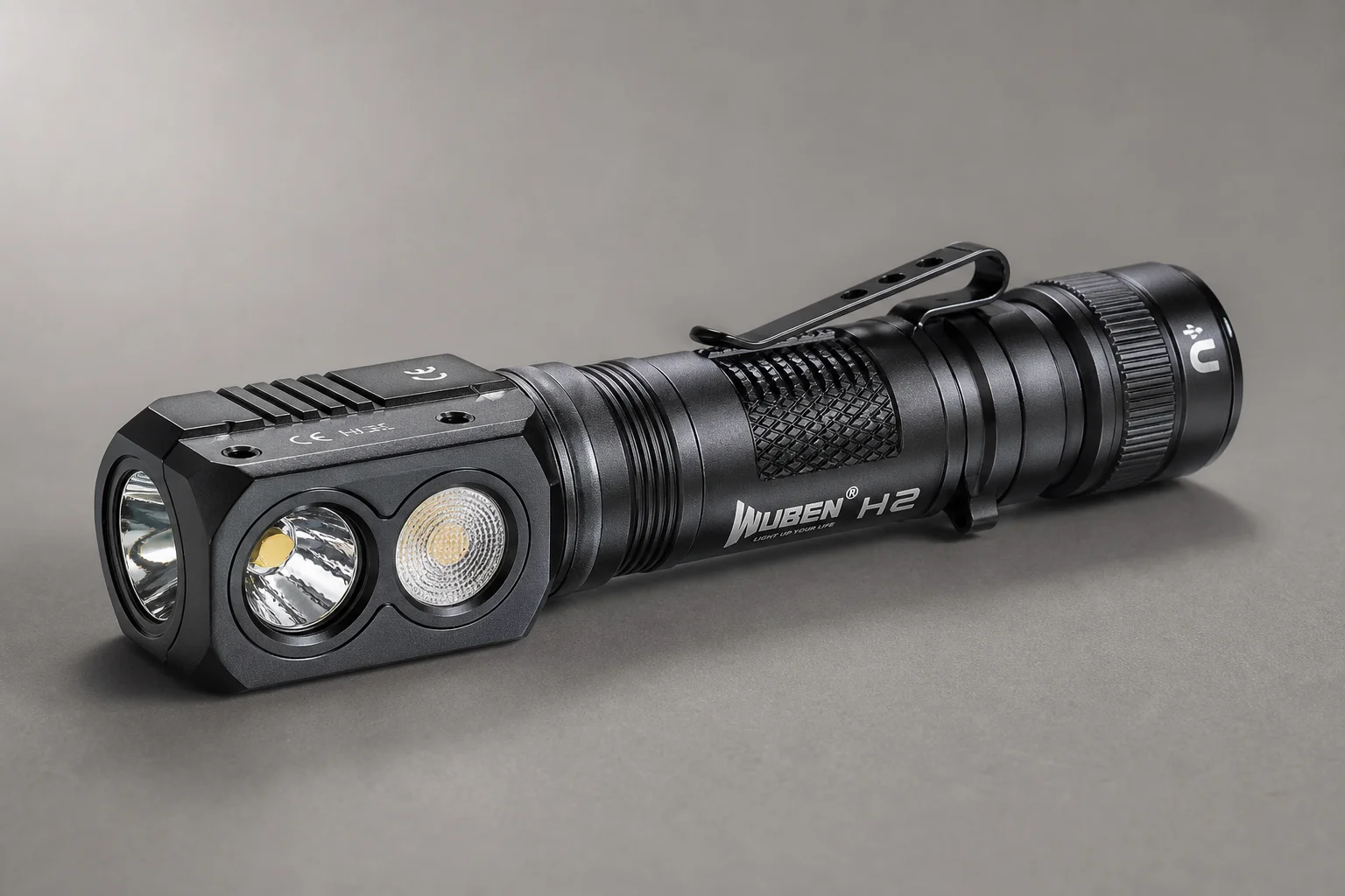 Five headlamps displayed on concrete surface showing range from compact to professional models