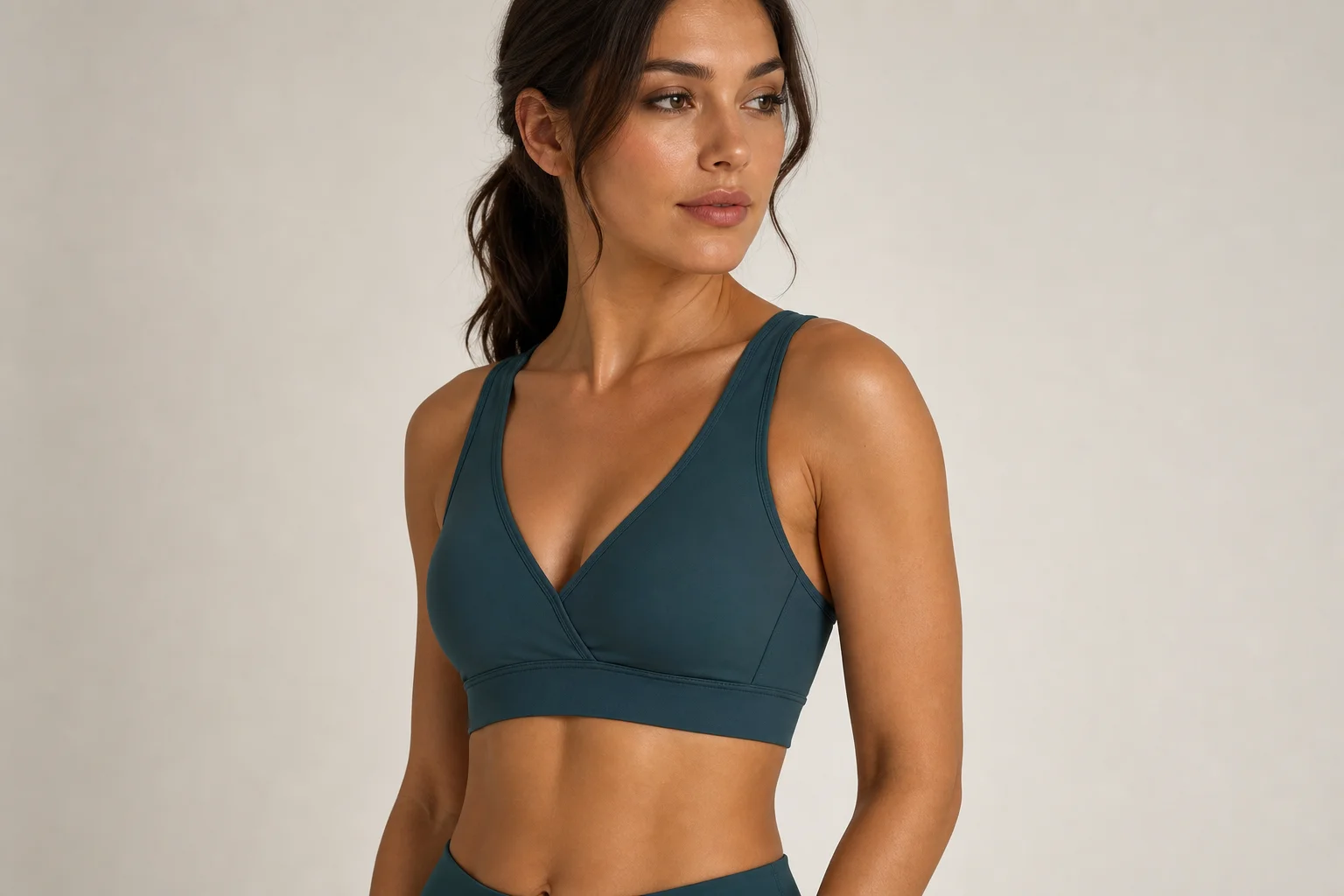 Collection of 12 high-impact sports bras in various styles and colors on neutral backdrop
