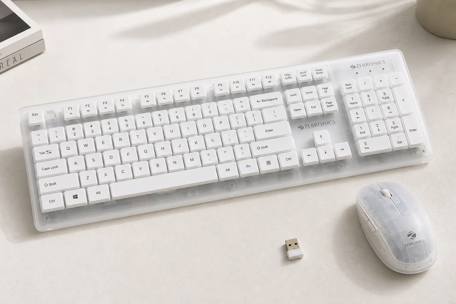 Eight gaming keyboard-mouse combos displayed on concrete surface showing various designs and colors